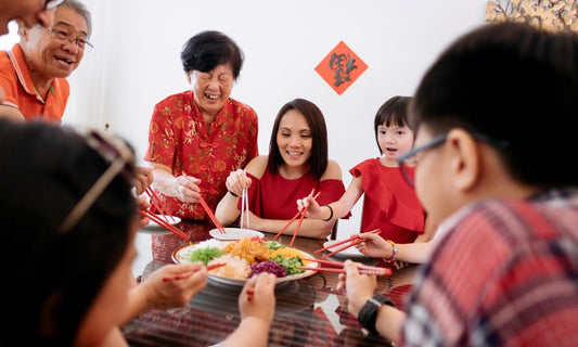 Family gathering together during the Chinese New Year to eat snacks