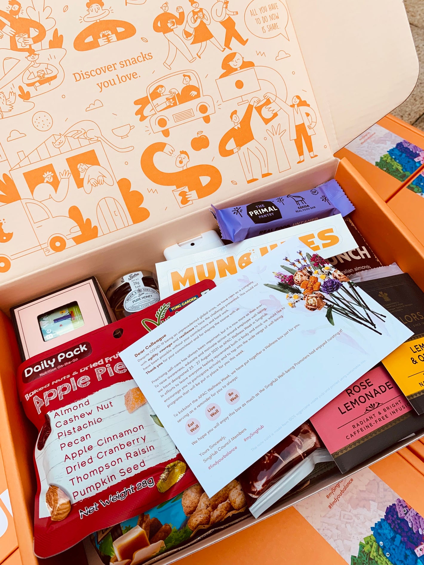 MUNCHEES wellness themed care pack specially curated for LEGO APAC team for their annual wellness week.
